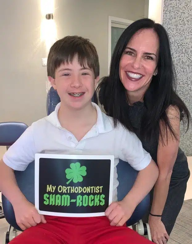 Boca Raton pediatric orthodontist patient with braces smiling – Statler Orthodontics